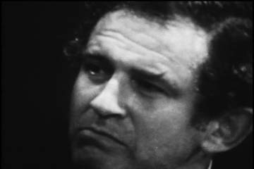 Close-up of the auteur: pensive and posing