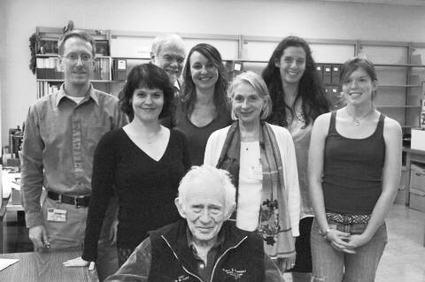 Norman Mailer and members of the Ransom Center Archival Processing Team. Back row, from left to right: Steve C. Mielke (Project Director), J. Michael Lennon (Project Adviser),Apryl Sullivan, Gabriela Redwine; Front row: Jennifer Hecker, Donna Pedro Lennon, Kathryn Hill. Photo by Pete Smith.
